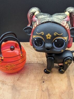 L.O.L. Surprise! Black & Gold Pet Doll with Red Lantern Accessory